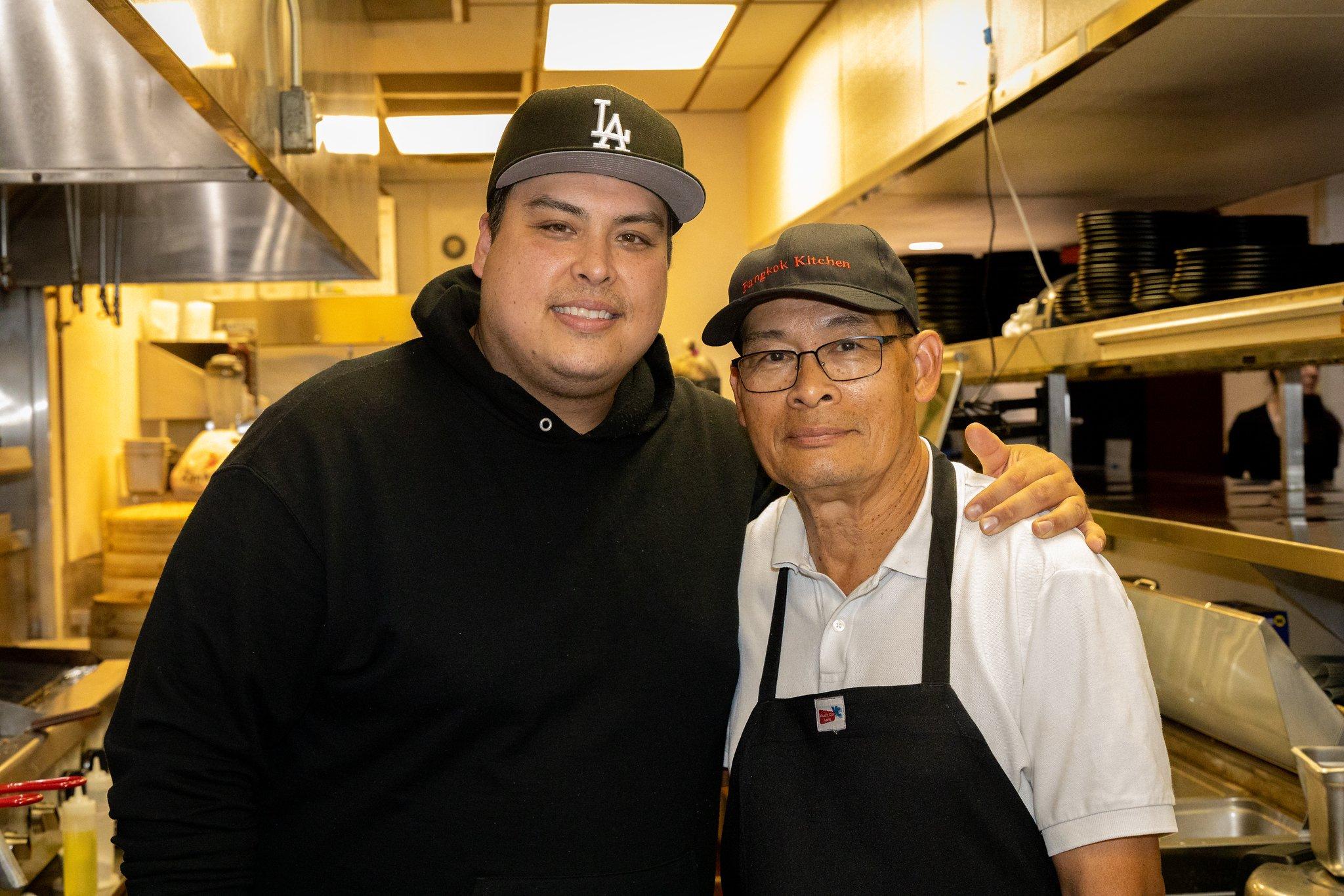 Yongyuth Sonjeow in the kitchen with his son